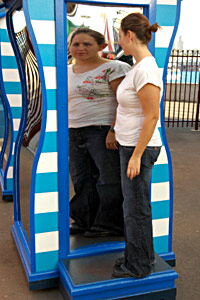 fun house mirror offers distorted body image to girl with bulimia