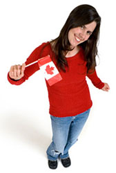 Canadian young woman waving flag