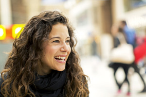 Portrait of a young attractive woman laughing