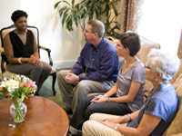 People in Discussion Around Table