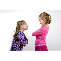Two young sisters arguing