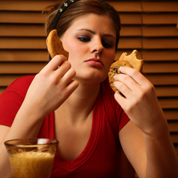 Girl Eating at Night