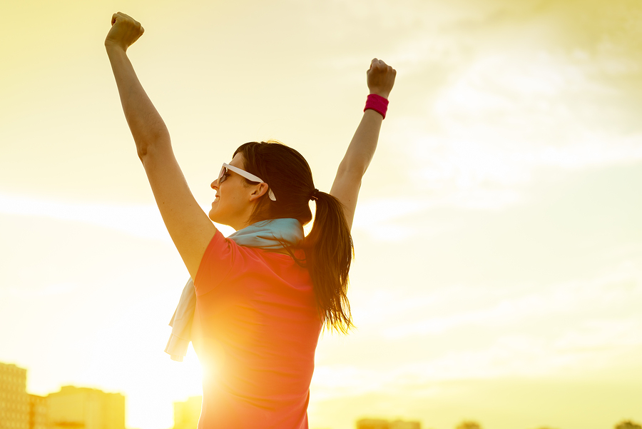 Woman with arms up