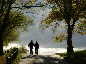 Two people walking on a path Exercising