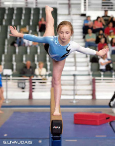 Girl struggling with eating disorders preparing for the Olympics on the beam