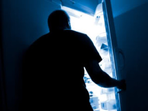 Man standing in front of refrigerator