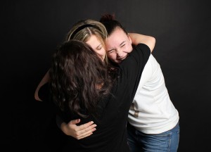 Roommates hugging