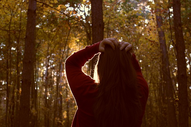 Girl in woods suffering from Bipolar Illness