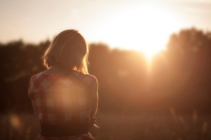 Girl looking at sunset