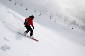 College student snowboarding