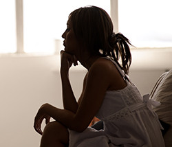 Woman considering eating disorder treatment in the U.S.