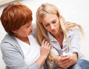 Mother discussing food allergies with daughter