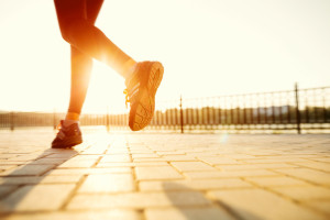 Closeup of runner doing his Exercise routine