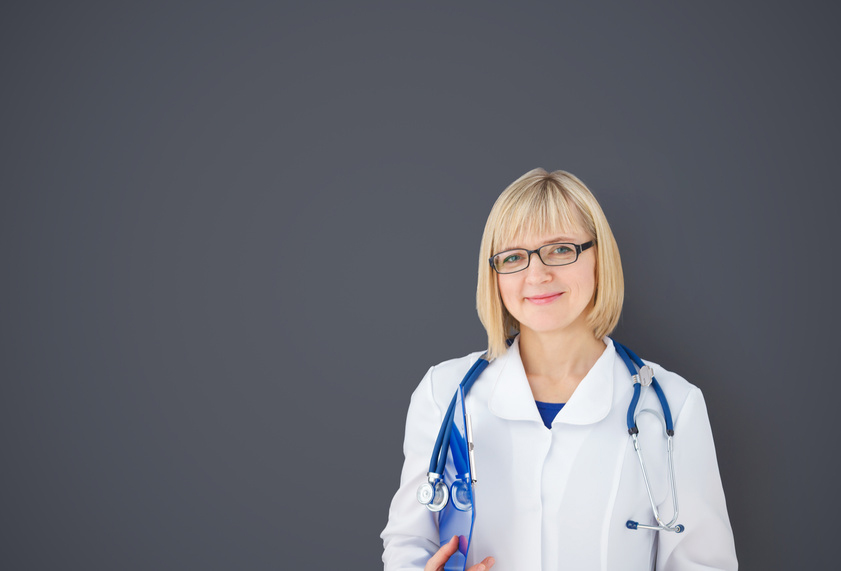 Doctor standing with stethoscope around her neck