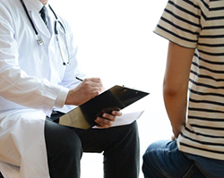 Doctor talking to a patient