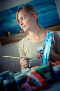 beautiful blonde woman painter