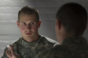 Shell-shocked soldier consoled by peer, horizontal
