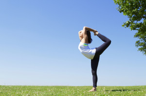Woman performing Yoga to help keep herself patient