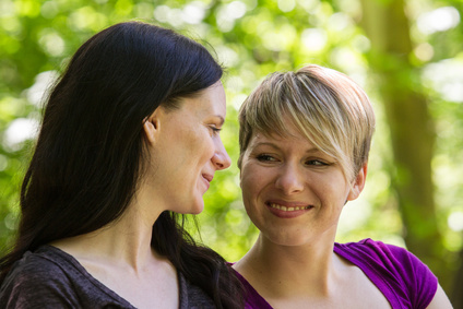 Mentor speaking with young woman