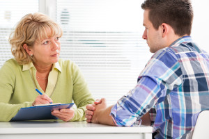 Doctor speaking with patient