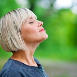 attractive woman breathing and relaxing