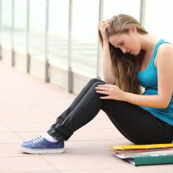 Girl thinking about when Teens Struggle with Bulimia and needing Online Therapy