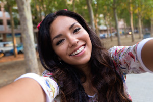 Pretty student girl taking a selfie.