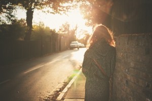 Young woman walking fighting social anxiety