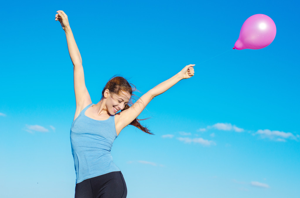 happy smiling woman overcame struggling with an eating disorder