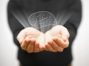 man showing virtual brains on open palm, idea concept
