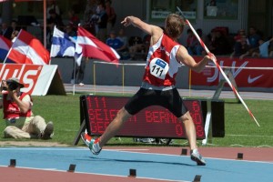 Male athlete throwing the javelin