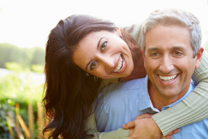 Portrait Of Loving Hispanic Couple In the Countryside
