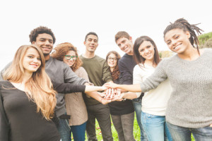 Multiracial Group of Friends with Hands in Stack, Teamwork