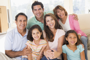 Extended family on vacation smiling