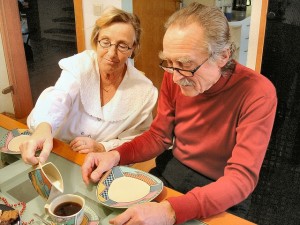 Grandparents  sitting down to coffee and to discuss their granddaughters eating disorder