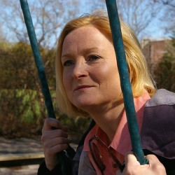 middle-aged woman sitting on swing thinking about Eating Disorders in Adulthood