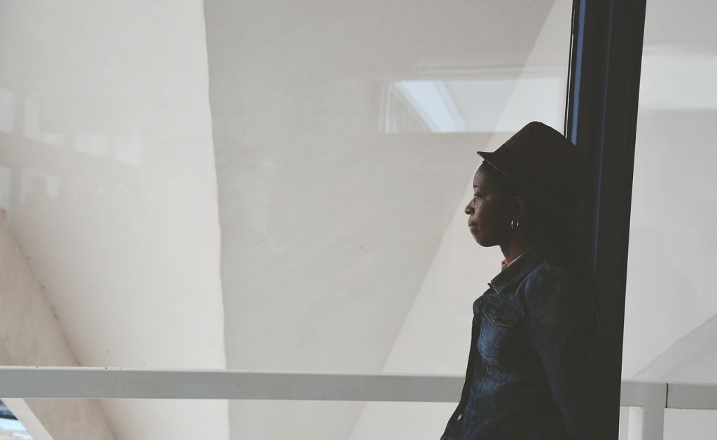 African American Woman thinking how Eating Disorders are Color Blind