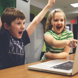 Children playing video game as a reward