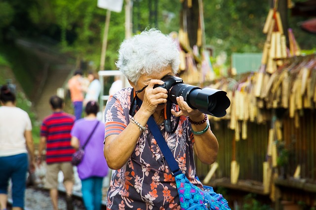 Older woman taking picture