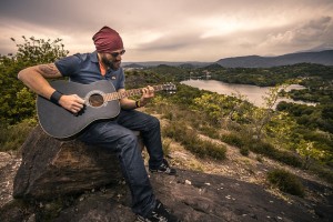 man playing guiitar