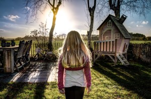 Woman walking into sunlight