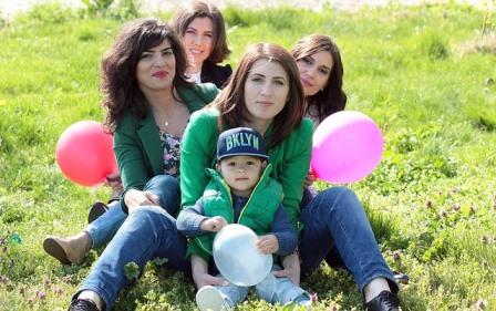 Family Holding Balloons