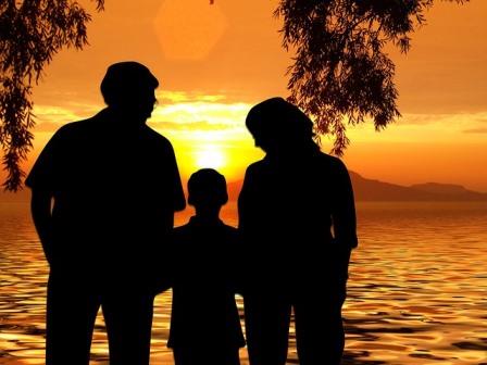 Family's silhoute at the beach