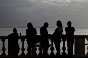 Family overlooking the ocean