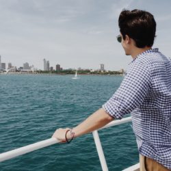 Man on a boat contemplating exposure-based therapy for eating disorders