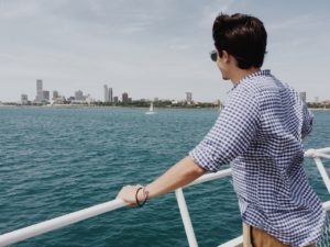 Man on a boat contemplating exposure-based therapy for eating disorders