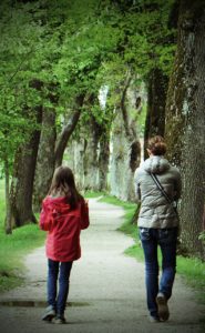 Mother daugher walking