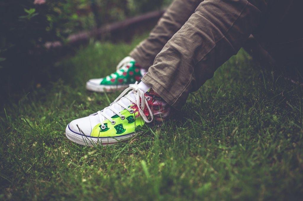 School student shoes in grass