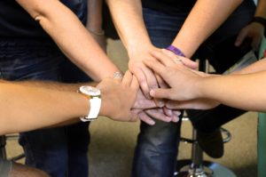 Women's support hands for helping break a Binge Eating Disorder and isolation cycle