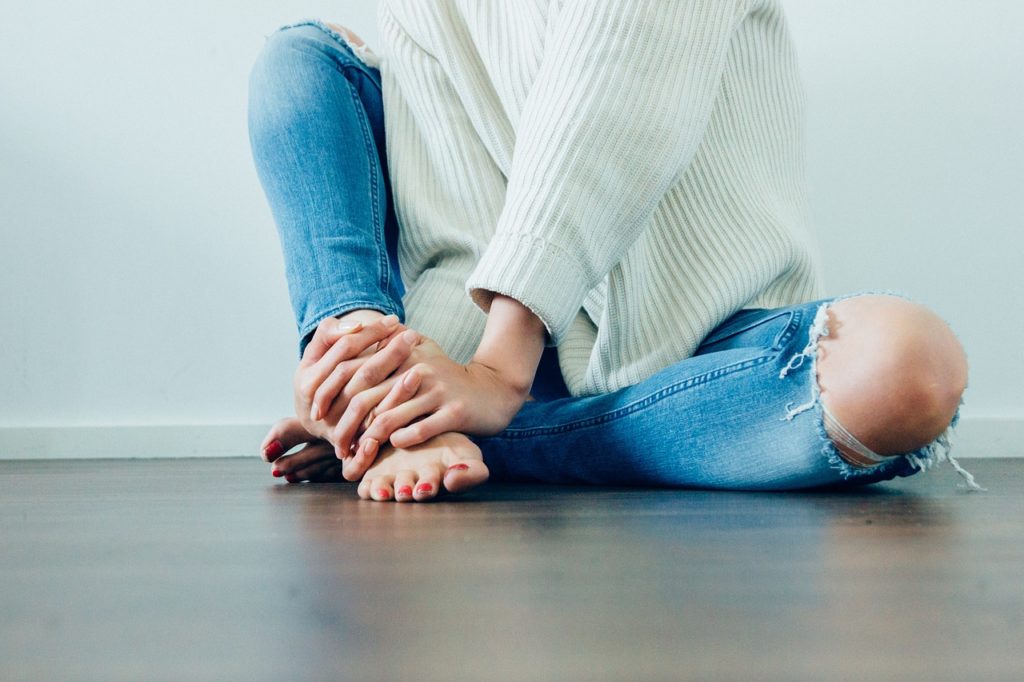 Woman sitting on floor